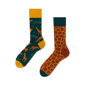 Detail of unique mismatched giraffe print socks in dark green and brown cotton blend