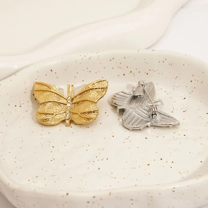 Elegant butterfly brooches in gold and silver finish with sparkling rhinestone inlay