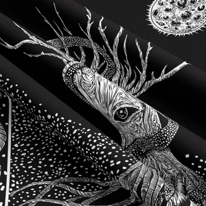 Detail of deer head and celestial moon pattern on black tapestry fabric background