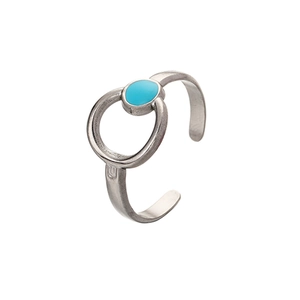 Detailed view of silver hollow sun ring with green turquoise stone on white background