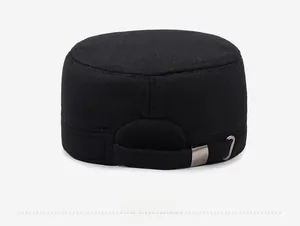 Detail view of the adjustable rear strap and metal buckle on the black winter flat top cap