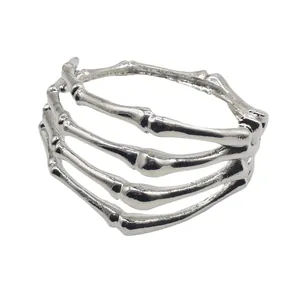 Adjustable punk skeleton hand cuff bracelet in silver finish with detailed bone texture