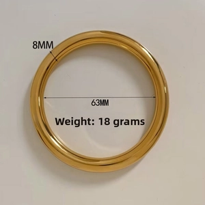 Polished gold stainless steel bangle details with 8mm width and 63mm inner diameter