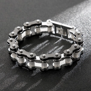 Detail of black and silver stainless steel motorcycle chain style bracelet for men