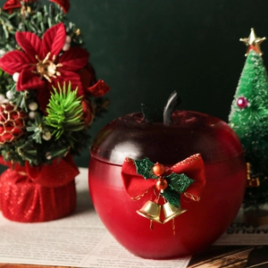 Bougeoir pomme rouge avec nœud en velours et cloches dorées pour décoration Noël