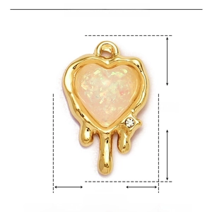 Macro view of heart-shaped resin stone pendant with gold stainless steel frame dimensions