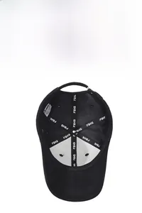 Detail view of the black baseball cap inner structure with breathable seams and fabric