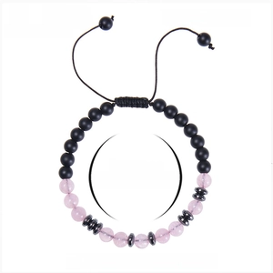 Soulmate Morse code bracelet with pink crystal and matte black beads on white background