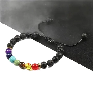 Adjustable seven chakra volcanic stone braided bracelet with colorful natural beads