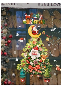 Christmas tree window stickers with Santa on a moon and reindeer on bakery glass