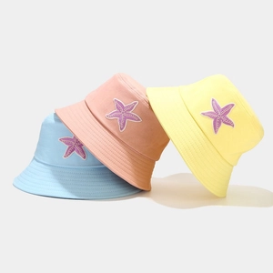 Cotton bucket hats with starfish embroidery in sky blue, pink and yellow for sun protection