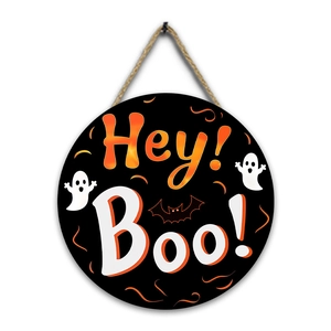 Detail of wooden Halloween hanging sign with orange Hey Boo text and ghost motifs