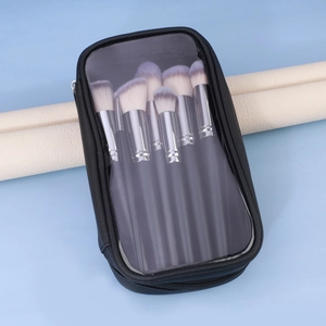 Detail of 8 makeup brushes with blue-purple gradient bristles in a clear waterproof bag