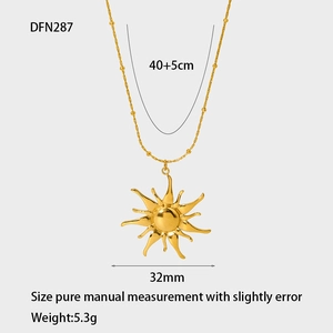 Detailed view of gold 18k plated sun pendant necklace with 32mm width and ball chain size