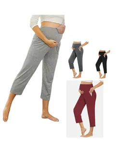 Detail of high-waisted maternity leggings showing flexible belly support in four colors