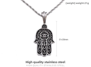 Close-up of Hamsa Hand and Evil Eye pendant in retro stainless steel with rope chain