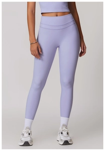 Detail of high-waist lavender yoga pants with reinforced double-stitched waistband