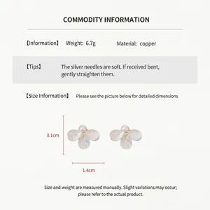 Detail showing earring dimensions of 3.1cm height and 1.4cm width on a plain background