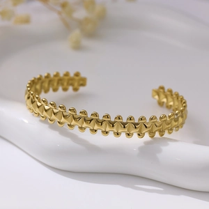 18k gold plated stainless steel open C-shape cuff bracelet with geometric textured surface