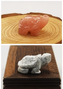 Detailed comparison of hand-carved rose quartz and white marble turtle figurines