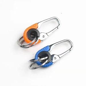 Business metal car keychain with orange and blue accents on a clean white background