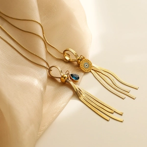 Gold plated titanium tassel necklace set with blue teardrop zircon and evil eye pendant