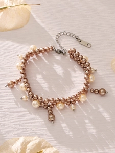Detailed shot of pearl bracelet with champagne beads and silver adjustable lobster clasp
