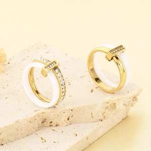 Minimalist white ceramic and gold-plated titanium steel ring set with zircon stones