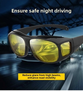 Macro detail of night vision driving glasses with yellow lenses and black frames