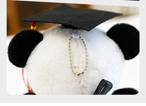 Close-up detail of the metal chain on a graduation panda plush toy keychain gift.