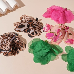 Floral woven raffia earrings with pearl accents in leopard print and green chiffon