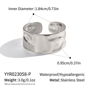 Detail of silver hammered stainless steel ring showing size and 0.95cm width measurements