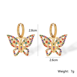 Detail view of 18K gold plated hollow butterfly earrings with colorful zircon crystals