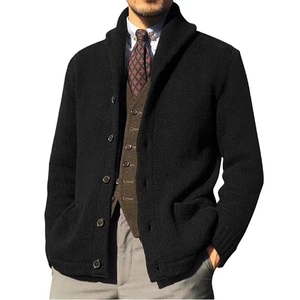 Detail of men's black knit cardigan featuring wide lapels and single-breasted button design