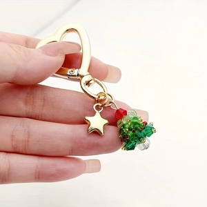 Creative crystal beaded Christmas tree keychain with gold star and heart ring details