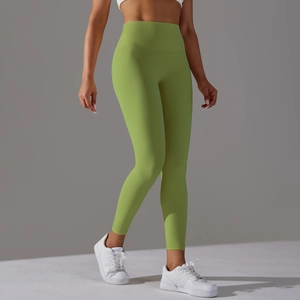 Close-up of high-waisted seamless avocado green yoga leggings with butt-lifting feature