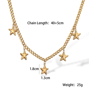 Detail view of 18K gold star pendant necklace showing precise measurements and dimensions