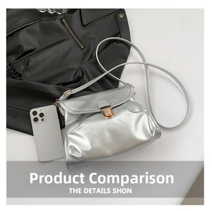 Silver metallic shoulder bag detail showing golden twist lock and size reference with a phone