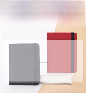 Detail of RFID-blocking passport holders in gray and wine red with elastic strap