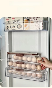 Three-layer clear rolling egg holder for refrigerator side door with timer feature