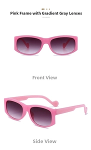 Close-up of pink square sunglasses with grey gradient lenses and heart temple details