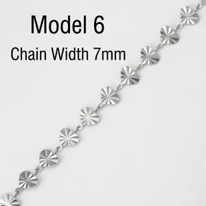 Detail of 7mm silver stainless steel heart chain with sunburst texture links