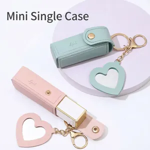 Mini PU leather lipstick case with heart mirror keychain in mint green and pink colors