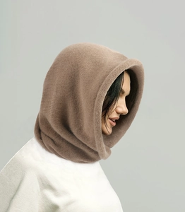 Side view of a light brown knitted hood scarf with soft cashmere-like texture