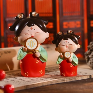 Traditional Tang dynasty resin figurines with red and green Hanfu and folding fans
