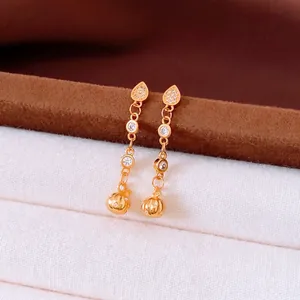 24k gold plated drop earrings with white zircon crystals and textured ball charms