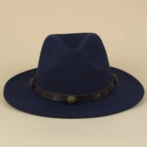 Detail of navy felt fedora featuring a brown leather band with ornate metal buckle and X-stitches