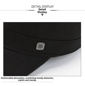Détail d'une casquette militaire en sergé de coton avec boucle décorative en métal argenté