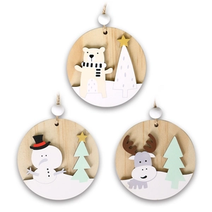 Three round wooden Christmas ornaments with polar bear, snowman and reindeer designs