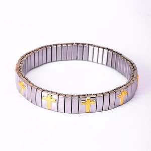 Elastic stainless steel bracelet with golden cross charms on silver modular links